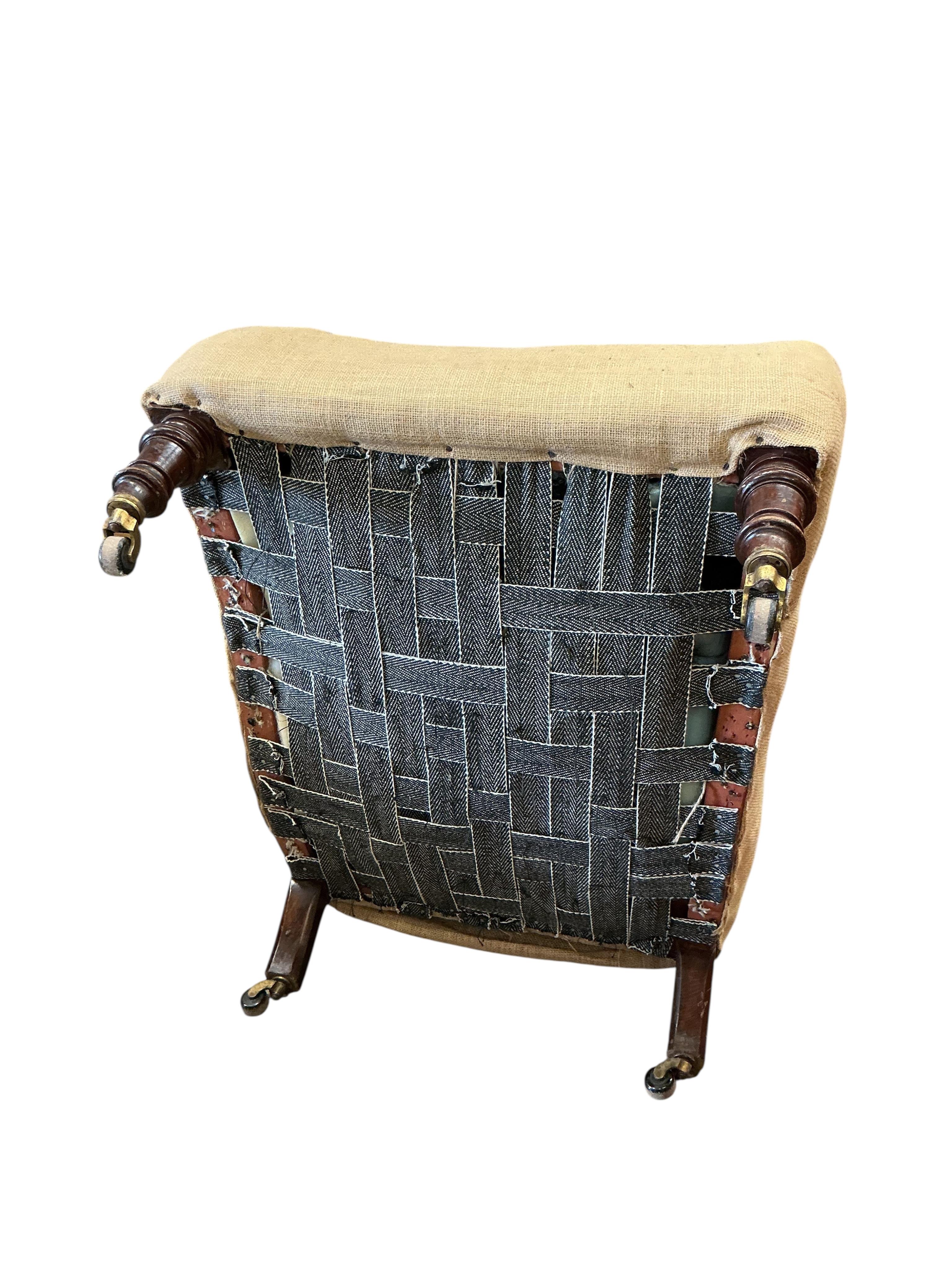 A Victorian Maple & Co. hessian covered library chair, width 72cm, depth 80cm, height 92cm